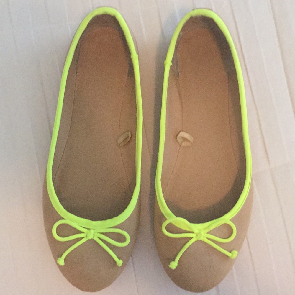 Beige and neon yellow flats.